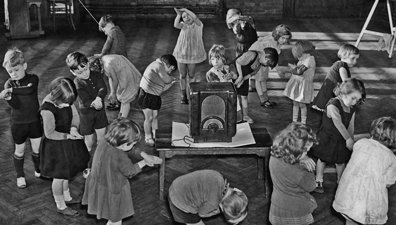 1935. Primary school children dance to the beat of music broadcast by the BBC. Photo by FPG/Archive Photos/Getty Images