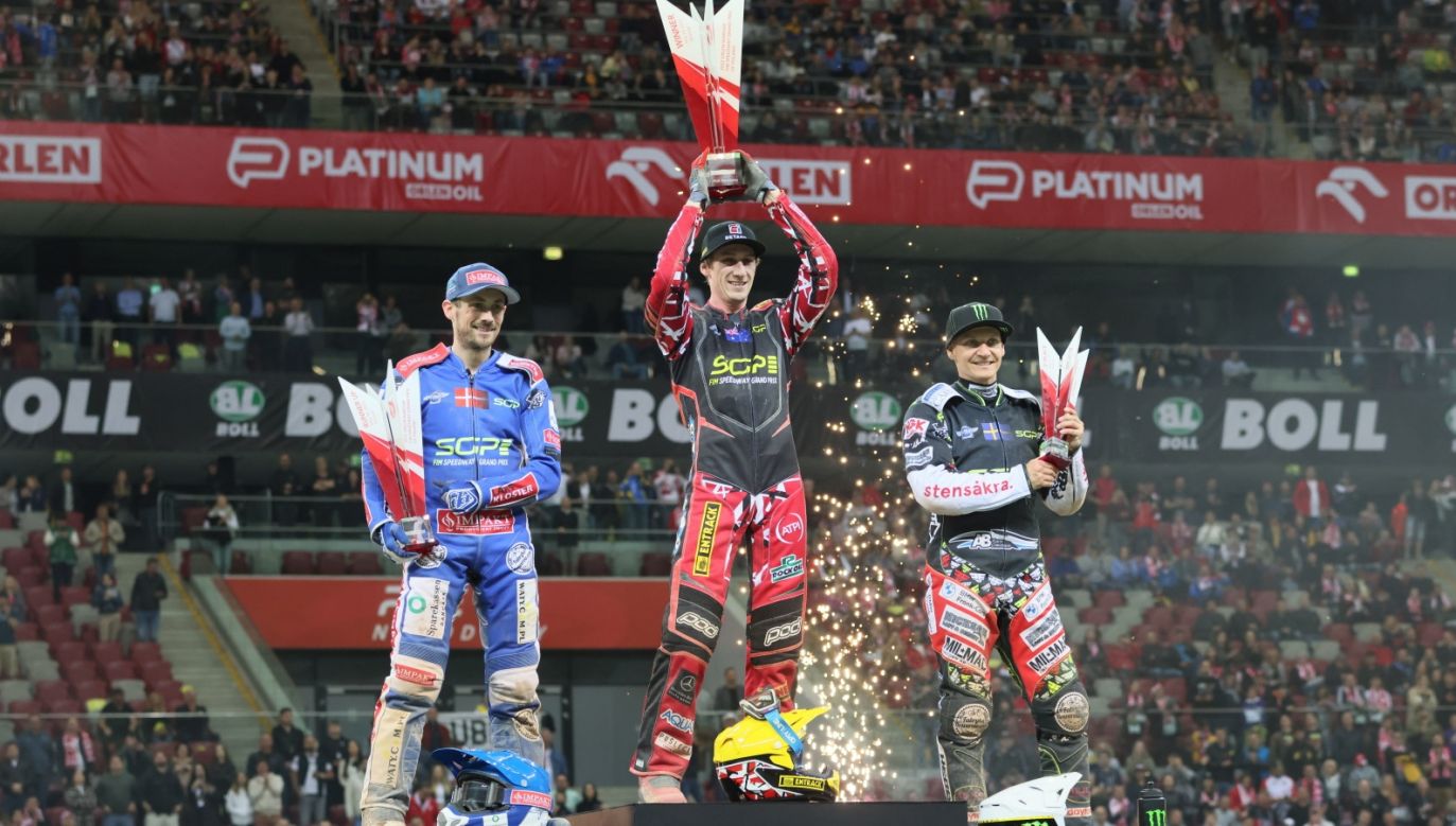 Australian Max Fricke (centre) won the 2022 Speedway Grand Prix	even in Warsaw. Dane Leon Madsen (left) and Swede Fredrik Lindgren (right) came in second and third respectively. PAP/Leszek Szymański