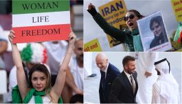 Protesty Iranek. Na dole z prawej Gianni Infantino i David Beckham podczas meczu Anglii z Iranem (fot. Getty)