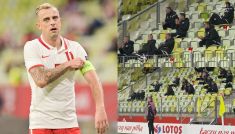 Robert Lewandowski celebrujący z trybun gole kolegów (fot. TVP/Getty)